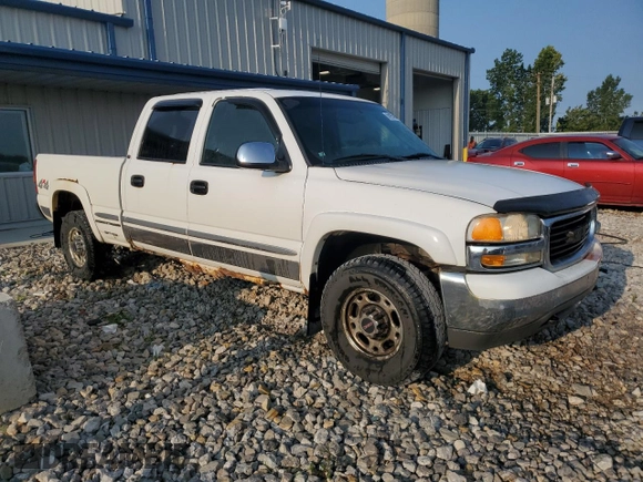 2002 GMC Sierra 1500HD SLE z VIN 1GTGK13U22F137583, wystawiony jako Copart lot #65997484 z przebiegiem 399 610 mil mil oraz Tytuł czysty. Historia ofert i sprzedaży dostępna na DreamBid. Obrazek 4.