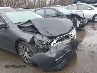2015 Acura TLX with VIN 19UUB1F39FA010517, listed as a IAAI auction lot 41966748 with 171,138 mi miles. Bid and sale history available at carsss.com. Image 6.