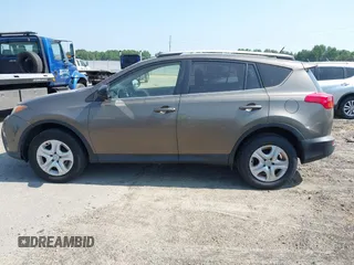 2014 Toyota RAV4 LE with VIN JTMZFREVXED034316, listed as a IAAI auction lot 42610135 with 214,871 mi miles and . Bid and sale history available at DreamBid. Image 15.