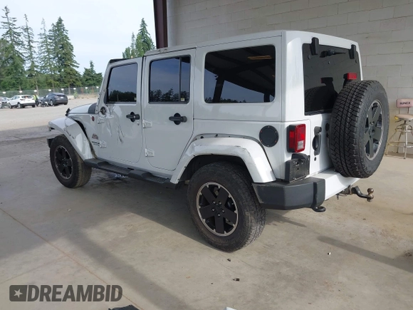 2012 Jeep Wrangler Unlimited Sahara with VIN 1C4BJWEG7CL275883, listed as a IAAI auction lot 42510764 with 149,531 mi miles and . Bid and sale history available at DreamBid. Image 3.
