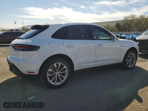 2023 Porsche Macan with VIN WP1AA2A59PLB10768, listed as a Copart auction lot 49745285 with 42,800 mi miles and Salvage Title. Bid and sale history available at carsss.com. Image 3.