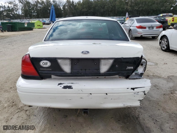 2011 Ford Police Interceptor with VIN 2FABP7BV3BX114168, listed as a Copart auction lot 43499085 with 124,544 mi miles and Salvage Title. Bid and sale history available at carsss.com. Image 6.