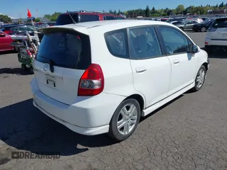 2007 Honda Fit Sport with VIN JHMGD38647S016342, listed as a IAAI auction lot 42058078 with 149,085 mi miles. Bid and sale history available at carsss.com. Image 4.
