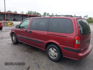 2003 Chevrolet Venture Warner Bros 1SE z VIN 1GNDX13E23D279465, wystawiony jako IAAI lot #41384442 z przebiegiem 124 033 mil mil oraz . Historia ofert i sprzedaży dostępna na DreamBid. Obrazek 3.