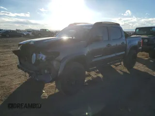 2017 Toyota Tacoma SR5 with VIN 5TFAZ5CN6HX043646, listed as a Copart auction lot 87327834 with 86,879 mi miles and Salvage title. Bid and sale history available at DreamBid. Image 1.