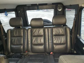 2002 Mercedes-Benz G-Class with VIN WDCYR49E22X128940, listed as a Copart auction lot 84952074 with 255,284 mi miles and Clean Title. Bid and sale history available at carsss.com. Image 10.