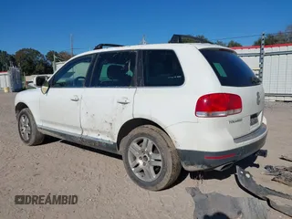2005 Volkswagen Touareg 4.2L V8 with VIN WVGZM77L15D032276, listed as a IAAI auction lot 41167339 with 213,926 mi miles and . Bid and sale history available at DreamBid. Image 3.