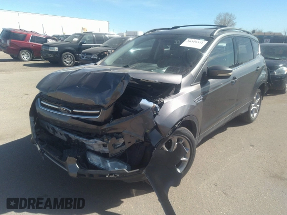 2013 Ford Escape SEL with VIN 1FMCU9H9XDUB32041, listed as a IAAI auction lot 36310371 with 99,560 mi miles. Bid and sale history available at carsss.com. Image 2.