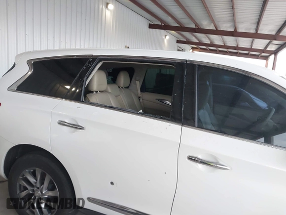 2013 Infiniti JX35 with VIN 5N1AL0MM4DC342673, listed as a IAAI auction lot 41813025 with 125,982 mi miles and . Bid and sale history available at DreamBid. Image 6.