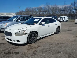 2011 Nissan Maxima S with VIN 1N4AA5AP7BC863931, listed as a IAAI auction lot 41930873 with 154,704 mi miles and . Bid and sale history available at DreamBid. Image 2.