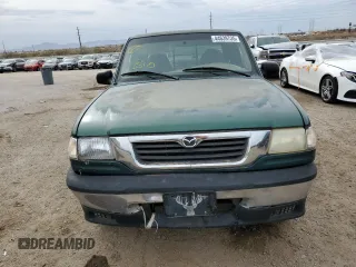 1999 Mazda B-Series 2WD Truck SE with VIN 4F4YR16X9XTM14266, listed as a Copart auction lot 44639735 with 199,397 mi miles and Salvage Title. Bid and sale history available at carsss.com. Image 5.