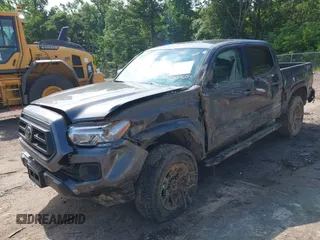 2022 Toyota Tacoma SR z VIN 3TYAX5GN5NT046897, wystawiony jako IAAI lot #42253604 z przebiegiem 69 246 mil mil oraz . Historia ofert i sprzedaży dostępna na DreamBid. Obrazek 17.