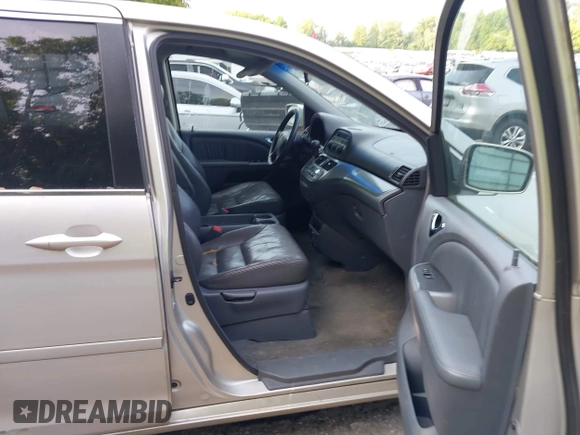 2005 Honda Odyssey EX-L with VIN 5FNRL38715B003399, listed as a IAAI auction lot 42589092 with 252,737 mi miles and . Bid and sale history available at DreamBid. Image 5.