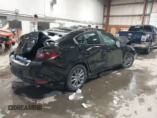 2024 Mazda 3 S with VIN 3MZBPAAM0RM423700, listed as a IAAI auction lot 41597191 with 4,920 mi miles and . Bid and sale history available at DreamBid. Image 4.