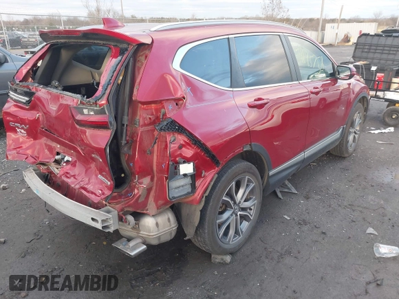 2020 Honda CR-V Touring with VIN 2HKRW2H96LH659793, listed as a IAAI auction lot 41145758 with 113,344 mi miles and . Bid and sale history available at DreamBid. Image 4.