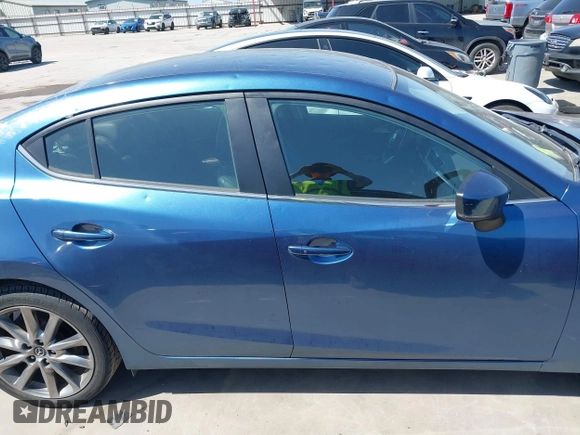 2018 Mazda 3 Touring with VIN 3MZBN1V38JM206827, listed as a IAAI auction lot 41983631 with 51,303 mi miles and . Bid and sale history available at DreamBid. Image 13.