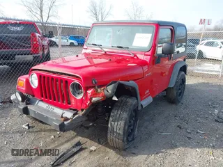 2003 Jeep Wrangler Sport with VIN 1J4FA49S53P305096, listed as a IAAI auction lot 41685209 with 165,247 mi miles. Bid and sale history available at carsss.com. Image 17.