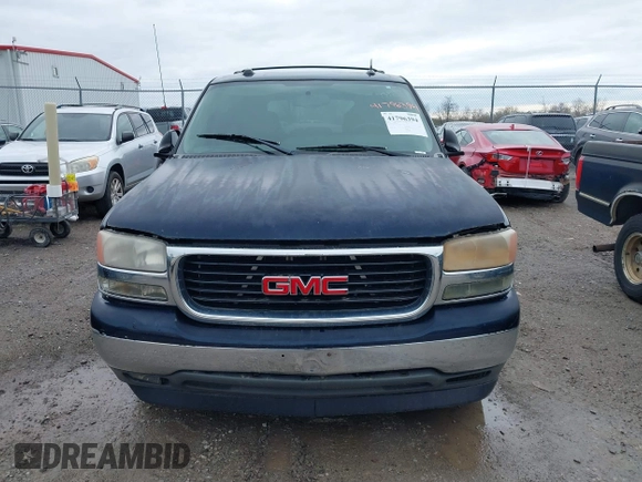 2005 GMC Yukon SLT with VIN 1GKEC13T45J139885, listed as a IAAI auction lot 41796394 with 229,494 mi miles. Bid and sale history available at carsss.com. Image 12.