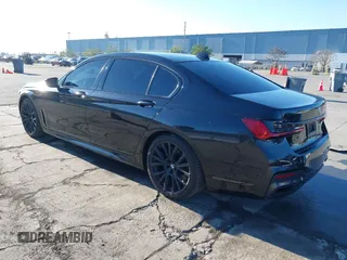 2022 BMW 7 Series 740i with VIN WBA7T2C02NCJ33925, listed as a IAAI auction lot 41377788 with 143,684 mi miles and . Bid and sale history available at carsss.com. Image 3.