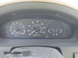 1999 Mazda 626 LX with VIN 1YVGF22D8X5871485, listed as a IAAI auction lot 41641049 with 115,603 mi miles. Bid and sale history available at carsss.com. Image 7.