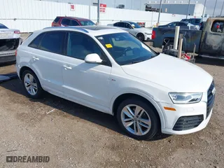 2018 Audi Q3 Premium with VIN WA1BCCFS8JR001155, listed as a IAAI auction lot 41157028 with 83,769 mi miles. Bid and sale history available at carsss.com. Image 1.