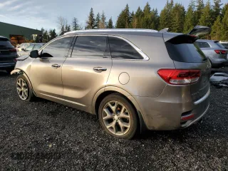 2016 Kia Sorento SXL z VIN 5XYPKDA16GG001293, wystawiony jako Copart lot #85128944 z przebiegiem 121 180 mil mil oraz Szkoda całkowita • Salvage title. Historia ofert i sprzedaży dostępna na DreamBid. Obrazek 2.
