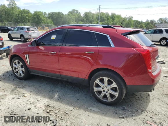 2016 Cadillac SRX Premium Collection with VIN 3GYFNDE3XGS508897, listed as a Copart auction lot 57886515 with 163,477 mi miles and Salvage title. Bid and sale history available at DreamBid. Image 2.