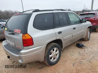 2005 GMC Envoy SLT with VIN 1GKDT13S452263166, listed as a IAAI auction lot 41543466 with 166,999 mi miles. Bid and sale history available at carsss.com. Image 4.