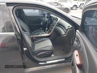 2013 Chevrolet Malibu LTZ with VIN 1G11H5SA2DU125573, listed as a IAAI auction lot 42047422 with 165,493 mi miles and . Bid and sale history available at DreamBid. Image 5.