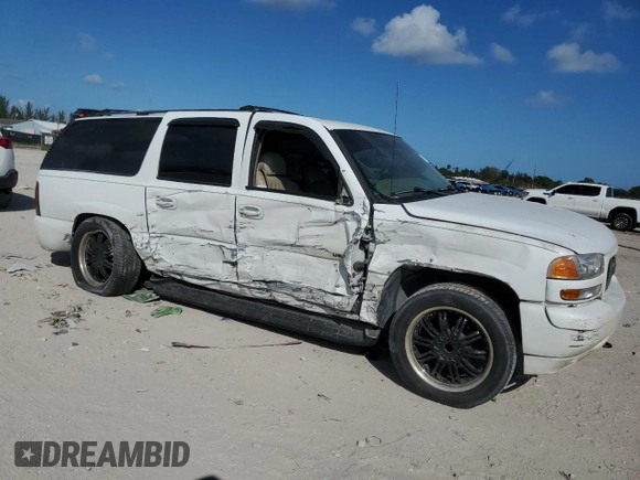 2001 GMC Yukon XL SLT with VIN 1GKEC16T51J253741, listed as a Copart auction lot 77461934 with 0 mi miles and Salvage Title. Bid and sale history available at carsss.com. Image 4.
