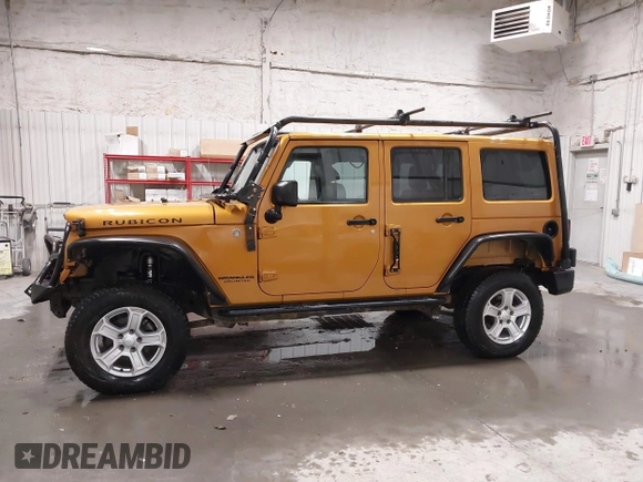 2014 Jeep Wrangler Unlimited Rubicon with VIN 1C4BJWFG7EL254534, listed as a IAAI auction lot 41279731 with 140,218 mi miles. Bid and sale history available at carsss.com. Image 14.