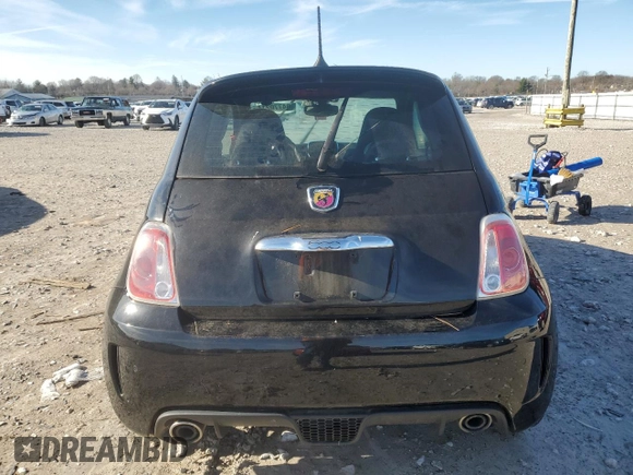 2017 FIAT 500 Abarth z VIN 3C3CFFFH1HT598484, wystawiony jako Copart lot #84770214 z przebiegiem 79 992 mil mil oraz Czysty tytuł • Clean title. Historia ofert i sprzedaży dostępna na DreamBid. Obrazek 6.