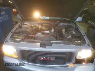 2000 GMC Denali z VIN 1GKEK13R9YR104210, wystawiony jako Copart lot #85599964 z przebiegiem 1 548 394 mil mil oraz Szkody całkowita. Historia ofert i sprzedaży dostępna na DreamBid. Obrazek 13.