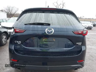 2022 Mazda CX-5 2.5 Turbo with VIN JM3KFBAY8N0635618, listed as a IAAI auction lot 41199038 with Not Provided miles and . Bid and sale history available at carsss.com. Image 16.
