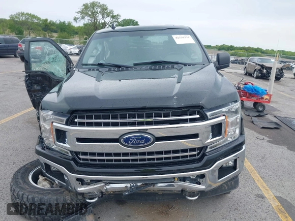 2018 Ford F-150 XL with VIN 1FTEW1E5XJKC37082, listed as a IAAI auction lot 42335721 with 167,401 mi miles and . Bid and sale history available at DreamBid. Image 11.