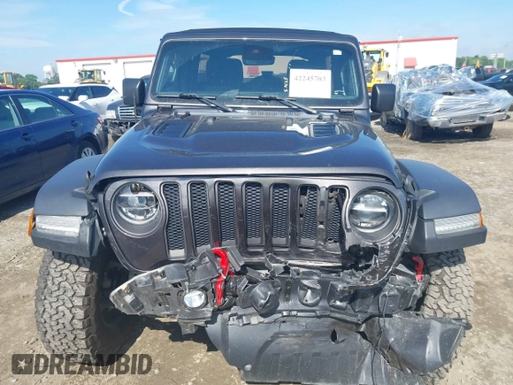 2021 Jeep Wrangler Unlimited Rubicon with VIN 1C4HJXFN5MW509483, listed as a IAAI auction lot 42245703 with 59,461 mi miles and . Bid and sale history available at DreamBid. Image 12.