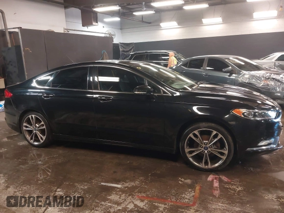 2017 Ford Fusion Titanium with VIN 3FA6P0D93HR197617, listed as a IAAI auction lot 41673022 with 65,041 mi miles and . Bid and sale history available at DreamBid. Image 13.
