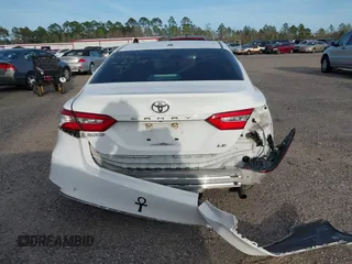 2019 Toyota Camry LE with VIN 4T1B11HK7KU806197, listed as a IAAI auction lot 41721148 with 83,373 mi miles and . Bid and sale history available at DreamBid. Image 16.