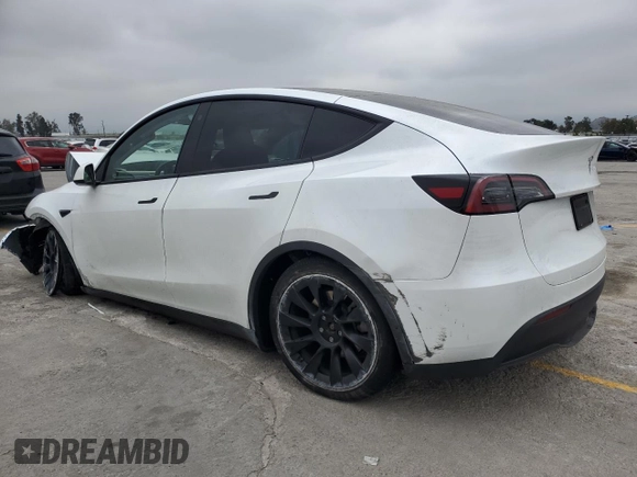 2023 Tesla Model Y Long Range z VIN 7SAYGDEE9PA070232, wystawiony jako Copart lot #55881805 z przebiegiem 38 276 mil mil oraz Szkoda całkowita • Salvage title. Historia ofert i sprzedaży dostępna na DreamBid. Obrazek 2.