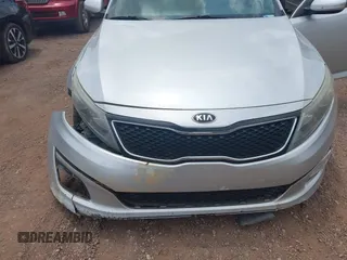 2015 Kia Optima LX z VIN 5XXGM4A70FG385024, wystawiony jako IAAI lot #42256238 z przebiegiem 162 395 mil mil oraz . Historia ofert i sprzedaży dostępna na DreamBid. Obrazek 6.