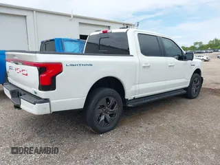 2022 Ford F-150 Lightning Pro with VIN 1FTVW1EL3NWG16132, listed as a IAAI auction lot 42362459 with 16,509 mi miles and . Bid and sale history available at DreamBid. Image 4.
