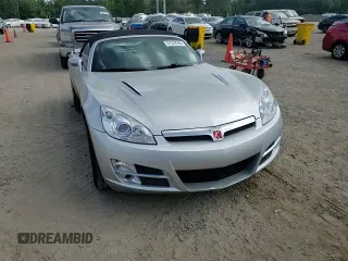 2007 Saturn Sky z VIN 1G8MB35B57Y135858, wystawiony jako Copart lot #57312395 z przebiegiem 46 140 mil mil oraz Szkoda całkowita • Salvage title. Historia ofert i sprzedaży dostępna na DreamBid. Obrazek 13.