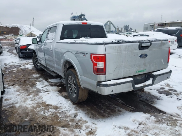 2018 Ford F-150 XL with VIN 1FTFW1E54JKC59793, listed as a IAAI auction lot 41558134 with 217,831 mi miles. Bid and sale history available at carsss.com. Image 3.