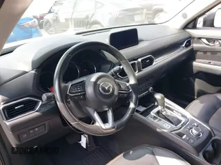 2020 Mazda CX-5 Grand Touring with VIN JM3KFADM3L1819939, listed as a IAAI auction lot 42749920 with 35,407 mi miles and . Bid and sale history available at DreamBid. Image 20.