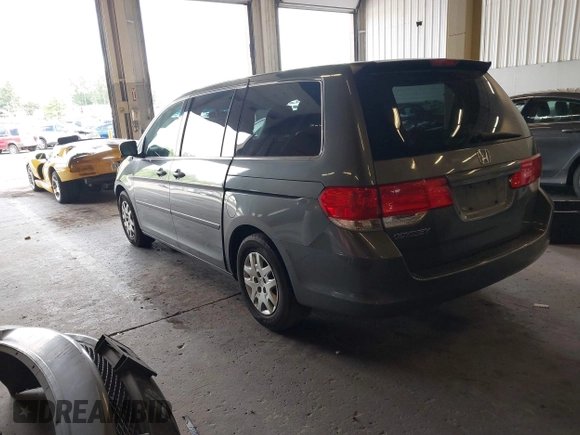 2008 Honda Odyssey LX with VIN 5FNRL38258B064490, listed as a IAAI auction lot 42228533 with 126,043 mi miles and . Bid and sale history available at DreamBid. Image 3.
