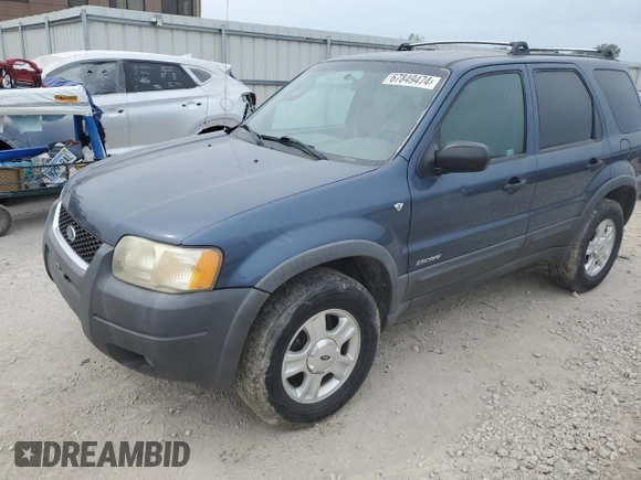 2001 Ford Escape XLT with VIN 1FMYU03131KF10968, listed as a Copart auction lot 67849474 with 197,328 mi miles and Salvage Title. Bid and sale history available at carsss.com. Image 1.
