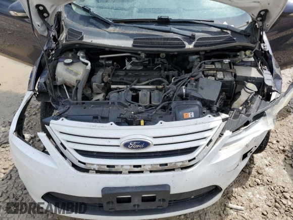 2013 Ford Fiesta SE z VIN 3FADP4EJ8DM146676, wystawiony jako Copart lot #55565485 z przebiegiem 168 801 mil mil oraz Szkoda całkowita • Salvage title. Historia ofert i sprzedaży dostępna na DreamBid. Obrazek 11.