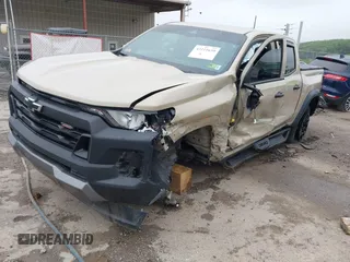 2024 Chevrolet Colorado 4WD Trail Boss with VIN 1GCPTEEK2R1155752, listed as a IAAI auction lot 42211659 with 28,428 mi miles and . Bid and sale history available at DreamBid. Image 2.