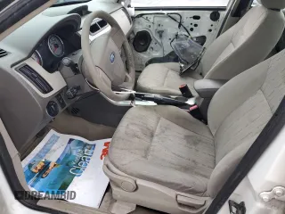2009 Ford Focus SE with VIN 1FAHP35NX9W235025, listed as a Copart auction lot 49841515 with 215,101 mi miles and Salvage Title. Bid and sale history available at carsss.com. Image 7.