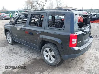 2014 Jeep Patriot Latitude with VIN 1C4NJRFBXED761411, listed as a IAAI auction lot 41914086 with Not Provided miles. Bid and sale history available at carsss.com. Image 3.